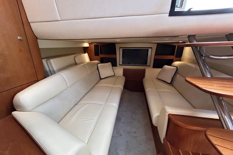  Yacht Photos Pics Luxurious interior of 2008 Tiara Yachts 3900 Sovran with plush seating and TV.