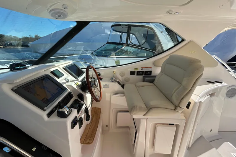  Yacht Photos Pics 2008 Tiara Yachts 3900 Sovran helm with leather seat and navigation controls.