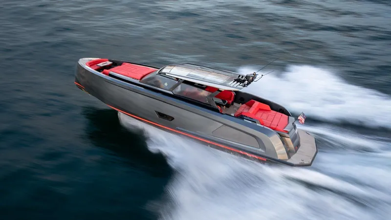 Moonshot Yacht Photos Pics 2023 Vanquish Yachts VQ58 speeding on water, featuring sleek design and vibrant red seating.