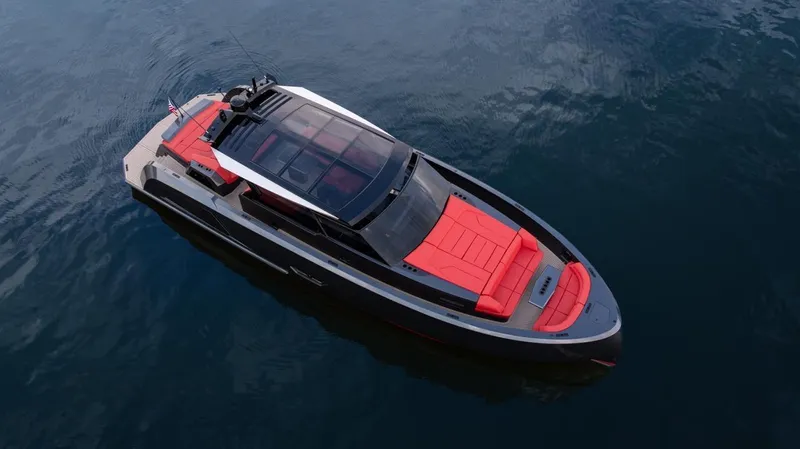 Moonshot Yacht Photos Pics 2023 Vanquish Yachts VQ58 luxury yacht with sleek design and vibrant red accents on water.