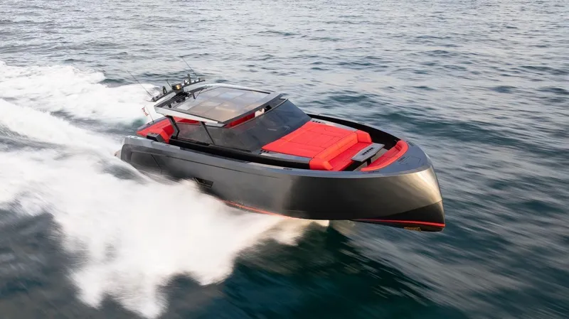 Moonshot Yacht Photos Pics 2023 Vanquish Yachts VQ58 cruising on open water, showcasing sleek design and luxury features.