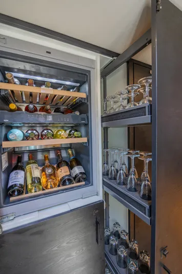 Moonshot Yacht Photos Pics Luxury yacht VQ58 wine fridge and glassware storage, 2023 Vanquish Yachts model.