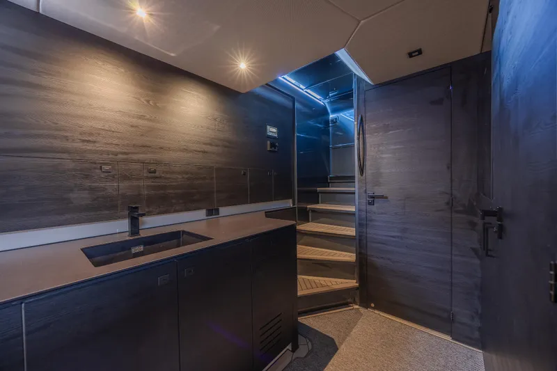 Moonshot Yacht Photos Pics Luxurious interior of 2023 Vanquish Yachts VQ58 with modern design and sleek finishes.