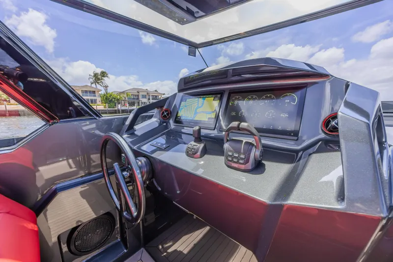 Moonshot Yacht Photos Pics 2023 Vanquish Yachts VQ58 helm with modern navigation and control systems.