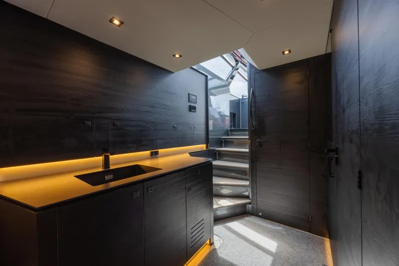 Moonshot Yacht Photos Pics Luxurious interior of 2023 Vanquish Yachts VQ58 with modern lighting and sleek design.