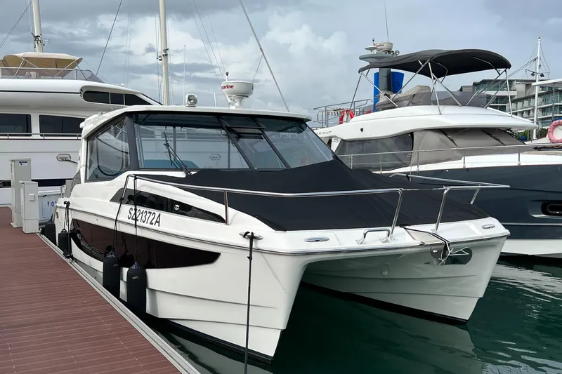 Yacht Photos Pics Aquila 36 Sport 2021 yacht docked at marina, featuring sleek design and modern amenities.