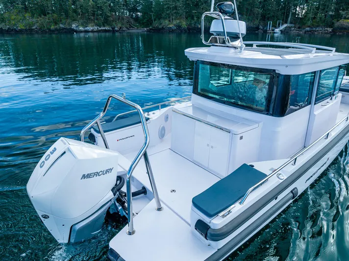 Windermere Yacht Photos Pics 2022 Axopar 28 boat with Mercury engine on calm water.