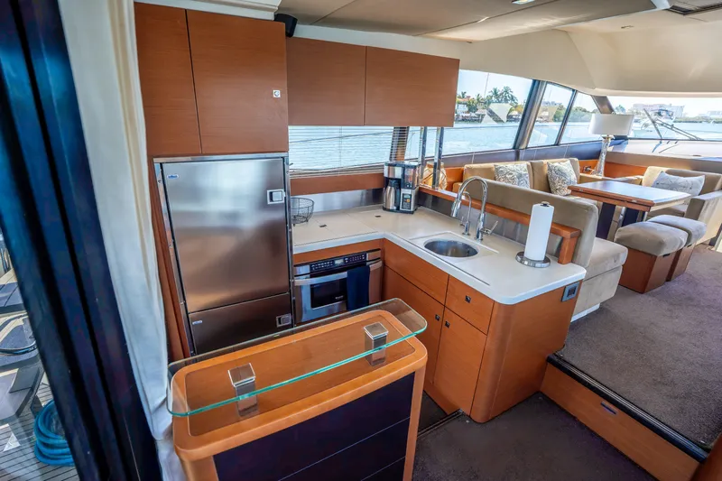  Yacht Photos Pics Luxurious 2012 Prestige 500 Fly yacht interior with modern kitchen and spacious seating area.