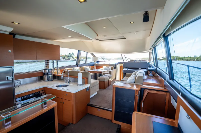  Yacht Photos Pics Luxurious interior of a 2012 Prestige 500 Fly yacht with modern amenities and scenic views.