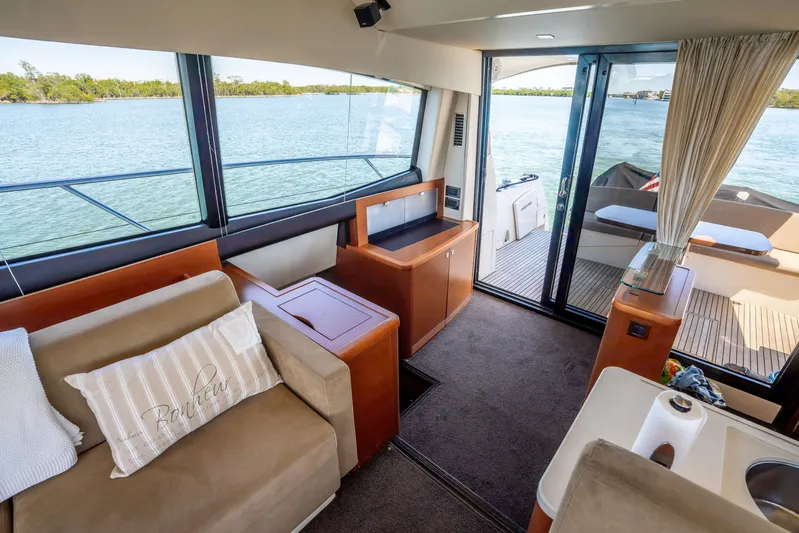  Yacht Photos Pics Interior of 2012 Prestige 500 Fly yacht with elegant seating and scenic water view.