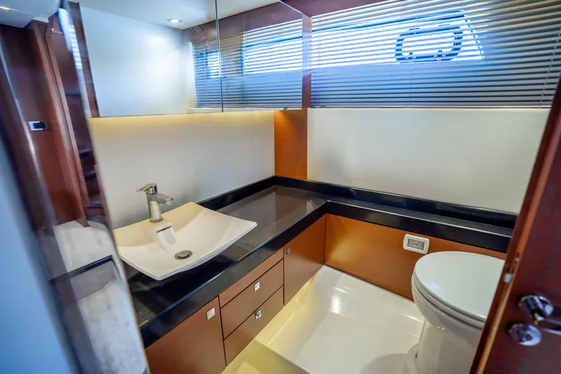  Yacht Photos Pics Luxurious bathroom in 2012 Prestige 500 Fly yacht with modern fixtures and elegant design.