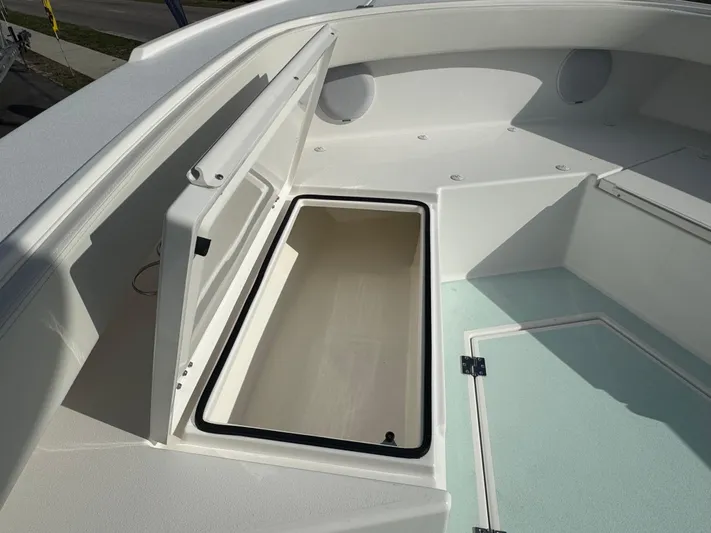  Yacht Photos Pics Open storage compartment on 2023 Albury Brothers 27 boat deck.