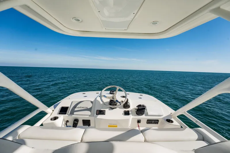  Yacht Photos Pics 2020 Pursuit S 408 Sport boat helm with ocean view.