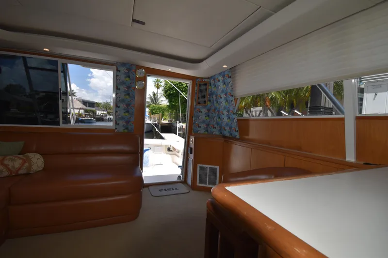 Yacht Photos Pics Interior of 1997 Tiara 4300 yacht with leather seating and tropical decor.