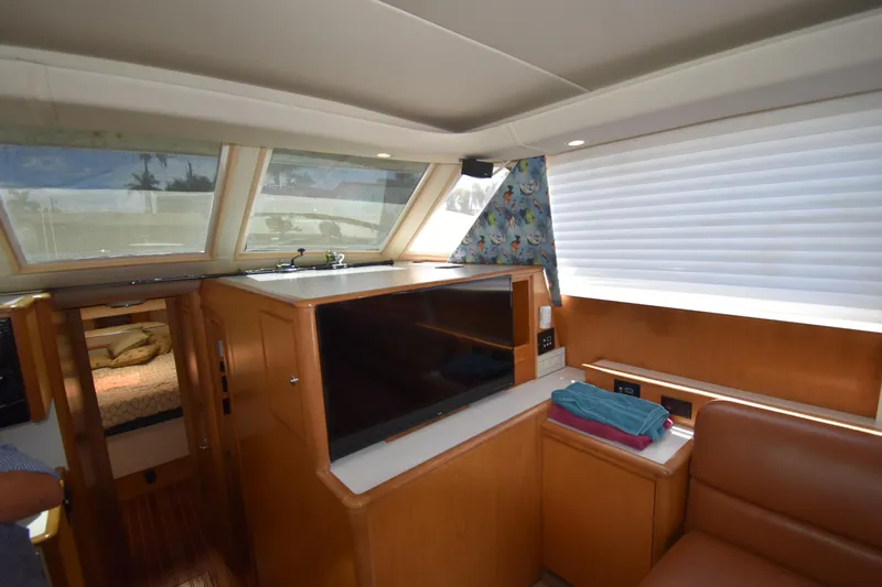  Yacht Photos Pics Interior of 1997 Tiara 4300 yacht with modern amenities and cozy seating area.