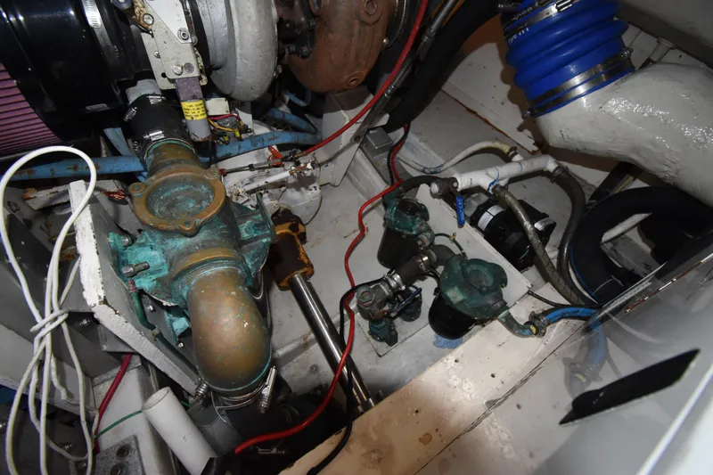  Yacht Photos Pics Engine compartment of a 1997 Tiara 4300, showcasing mechanical components and wiring.