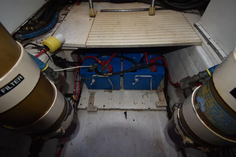  Yacht Photos Pics Engine compartment of 1997 Tiara 4300 with batteries and filters visible.