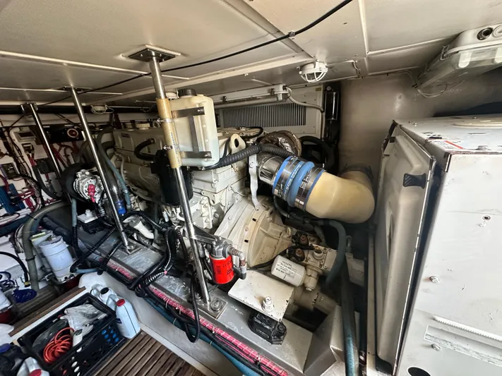 Bella Blue Yacht Photos Pics Engine room of 2004 Grand Banks 49 Eastbay HX, showcasing mechanical components and systems.