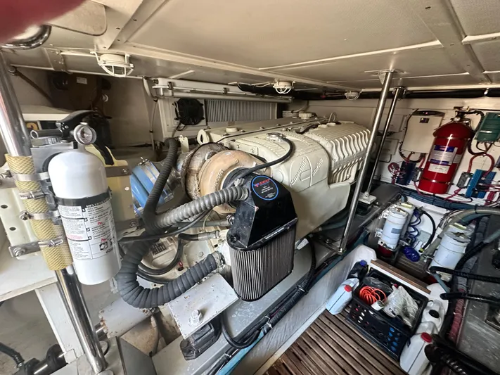 Bella Blue Yacht Photos Pics Engine room of 2004 Grand Banks 49 Eastbay HX with visible machinery and equipment.