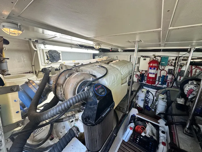 Bella Blue Yacht Photos Pics Engine room of 2004 Grand Banks 49 Eastbay HX with visible machinery and equipment.