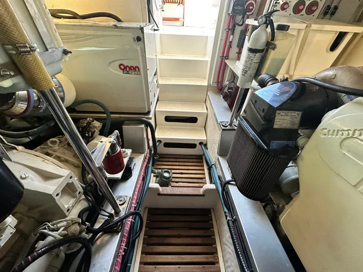 Bella Blue Yacht Photos Pics Engine room of 2004 Grand Banks 49 Eastbay HX, showcasing mechanical components and equipment.