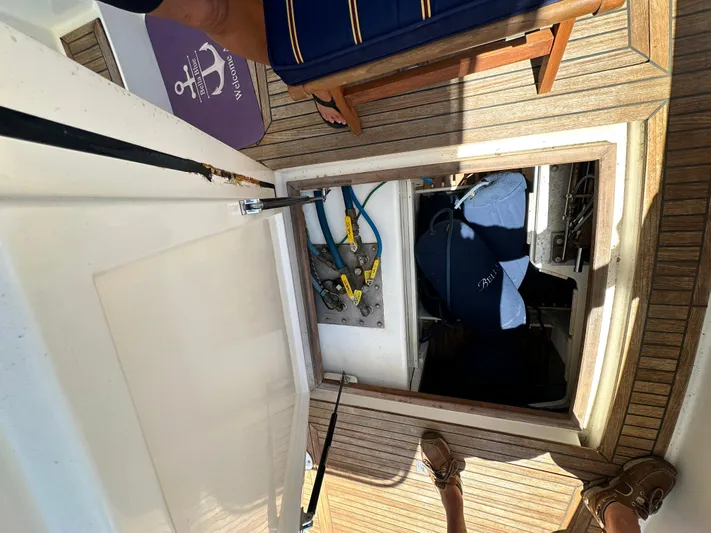 Bella Blue Yacht Photos Pics 2004 Grand Banks 49 Eastbay HX engine compartment with open hatch and visible equipment.