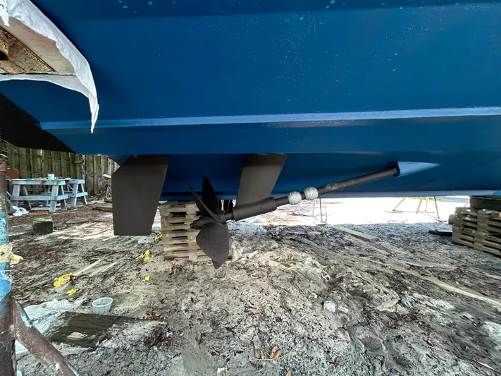 Bella Blue Yacht Photos Pics 2004 Grand Banks 49 Eastbay HX boat propeller and hull on dry dock.