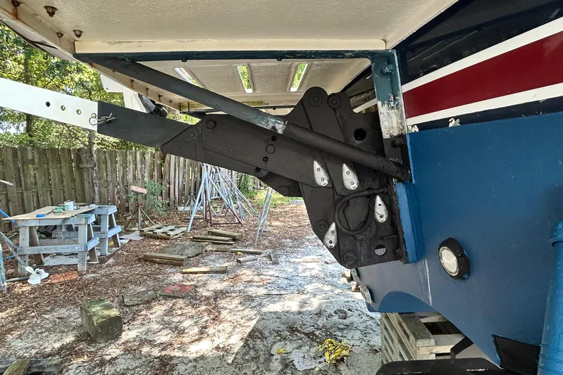 Bella Blue Yacht Photos Pics 2004 Grand Banks 49 Eastbay HX boat under maintenance, showing hull and rudder details.