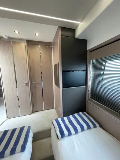 Almost Spoiled 1 Yacht Photos Pics Interior of 2020 Sunseeker 74 Sport Yacht with twin beds and modern design.