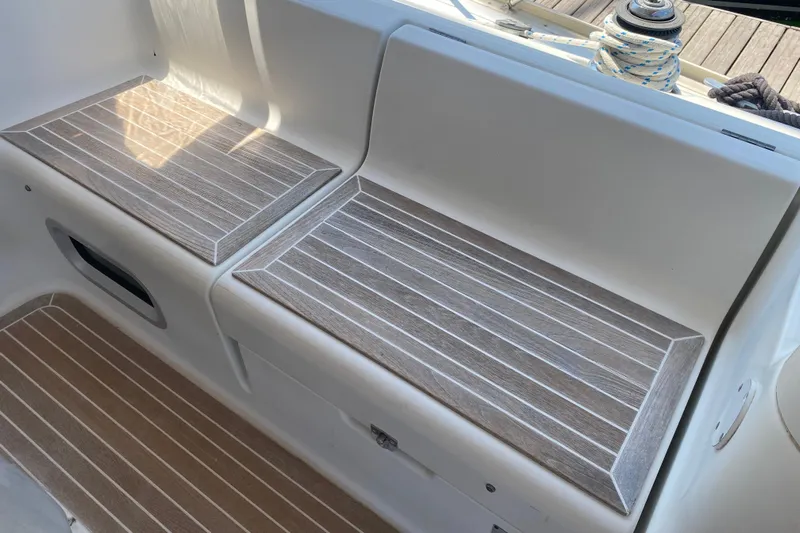  Yacht Photos Pics Teak seating area on 2002 Jeanneau Sun Odyssey 40 sailboat deck.