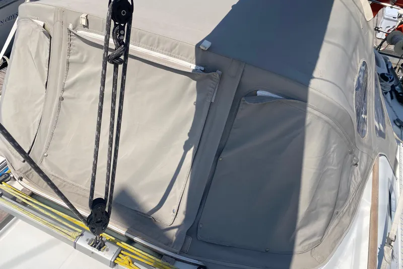  Yacht Photos Pics Jeanneau Sun Odyssey 40 sailboat cockpit cover, 2002 model, with rigging and zippers.