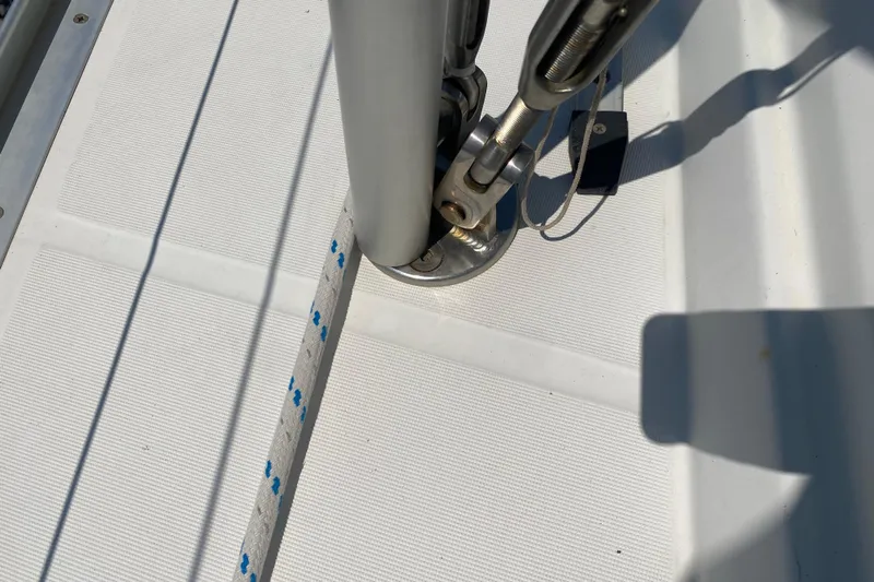  Yacht Photos Pics Deck detail of 2002 Jeanneau Sun Odyssey 40 sailboat, featuring rigging and rope.
