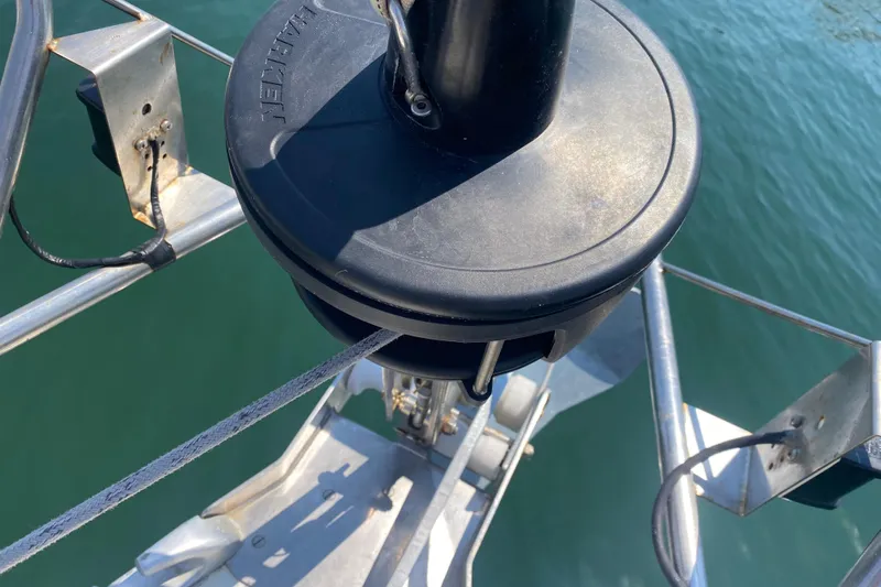  Yacht Photos Pics Close-up of Jeanneau Sun Odyssey 40 sailboat's anchor system, 2002 model, over water.