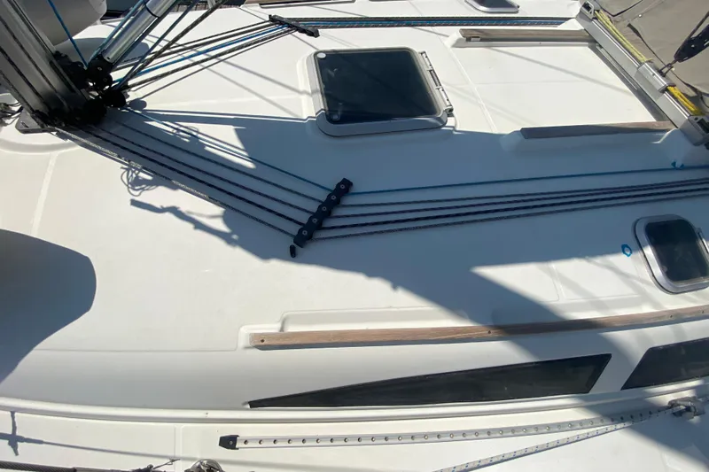  Yacht Photos Pics Deck of 2002 Jeanneau Sun Odyssey 40 sailboat with rigging and hatches.