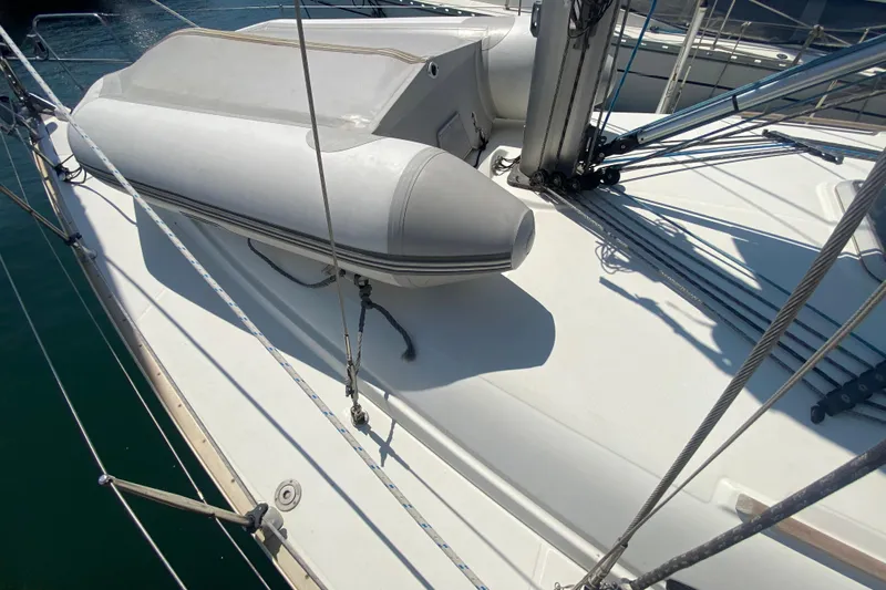  Yacht Photos Pics Deck of 2002 Jeanneau Sun Odyssey 40 with inflatable dinghy secured.