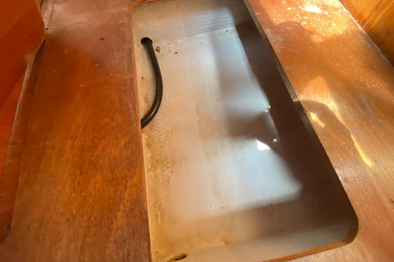  Yacht Photos Pics Interior storage compartment of 2002 Jeanneau Sun Odyssey 40 sailboat.