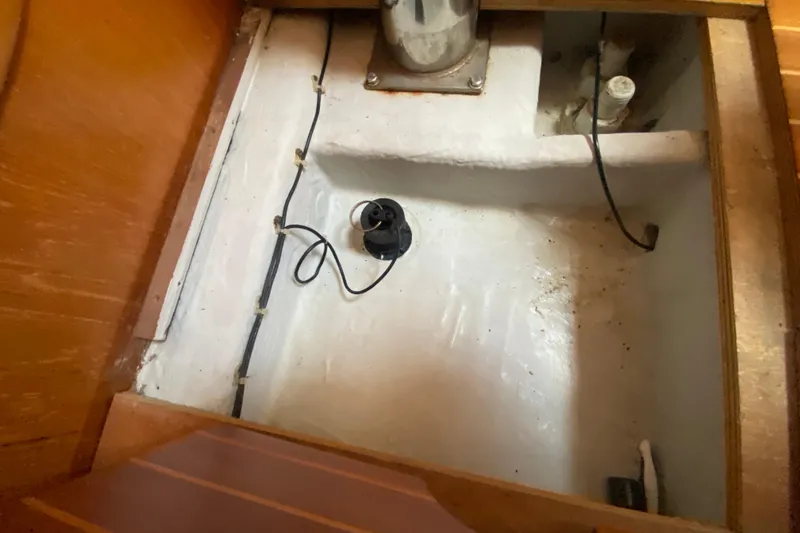  Yacht Photos Pics Bilge area of 2002 Jeanneau Sun Odyssey 40 sailboat, showing wiring and plumbing components.