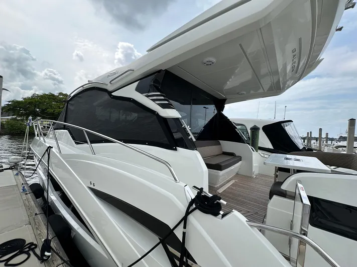 Stelyn Time Yacht Photos Pics 2021 Galeon 425HTS yacht docked, showcasing sleek design and modern features.