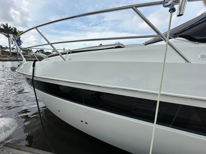 Stelyn Time Yacht Photos Pics 2021 Galeon 425HTS yacht docked by the water, showcasing sleek design and modern features.