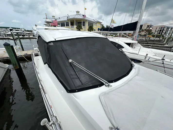 Stelyn Time Yacht Photos Pics Galeon 425HTS 2021 yacht docked at marina with covered windshield.