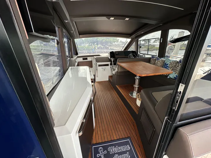 Stelyn Time Yacht Photos Pics Interior of 2021 Galeon 425HTS yacht with modern seating and wooden flooring.