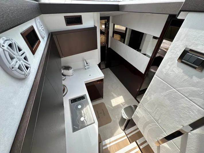 Stelyn Time Yacht Photos Pics Modern kitchen interior of 2021 Galeon 425HTS yacht with sleek design and appliances.