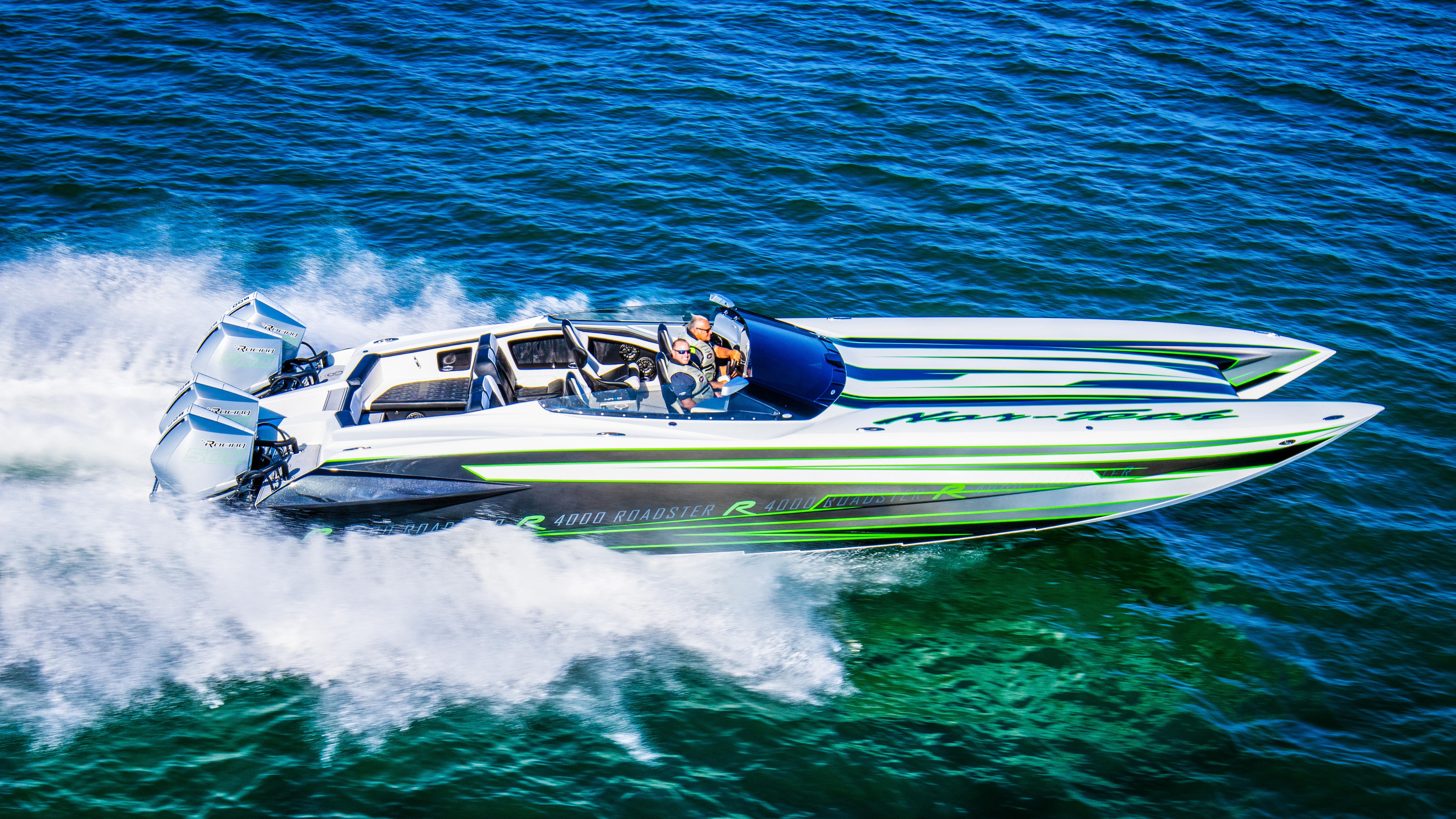 2025 Nor-Tech 4000 Supercat speedboat cruising on blue ocean waters.