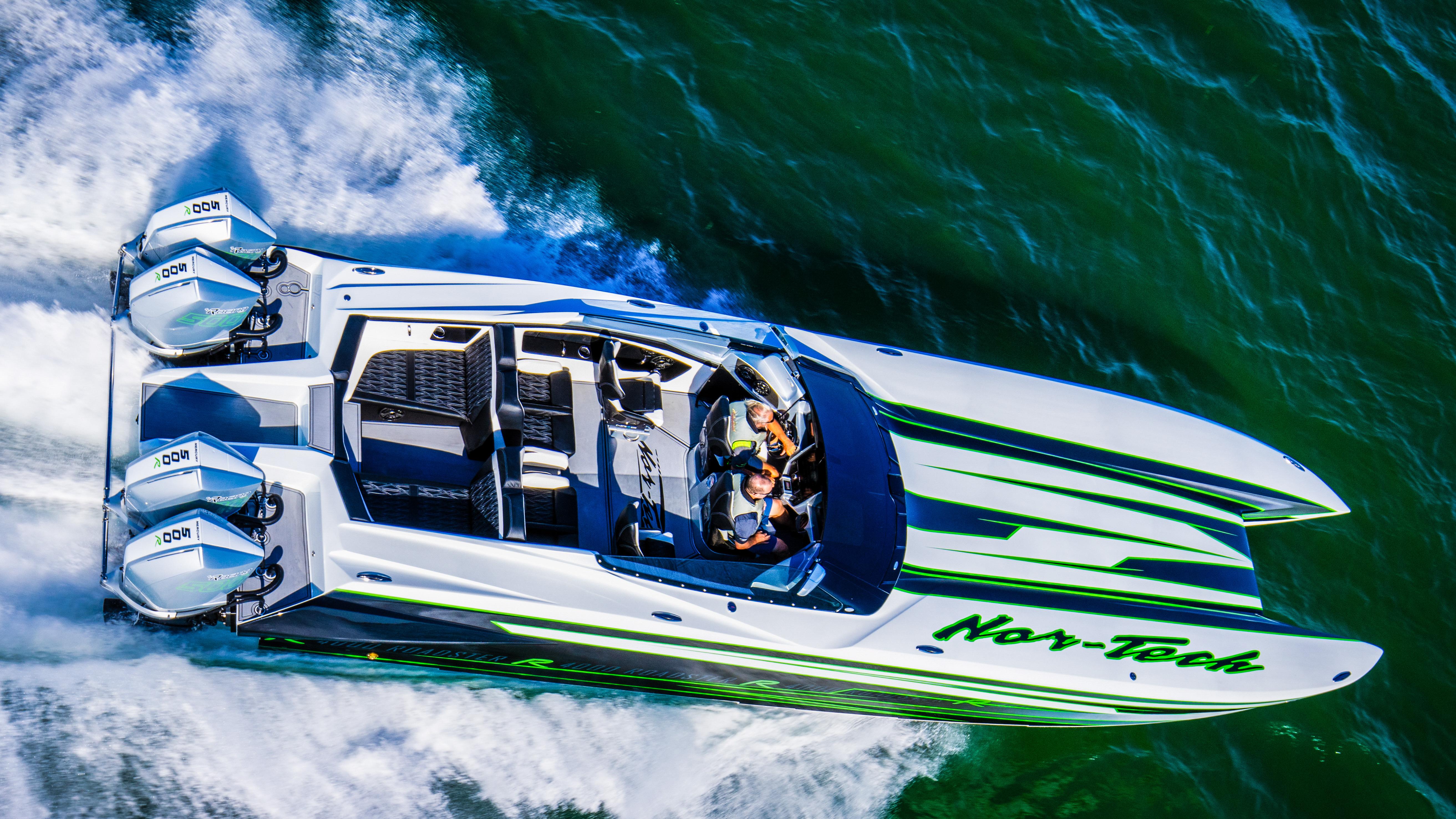 2025 Nor-Tech 4000 Supercat speedboat cruising on open water.