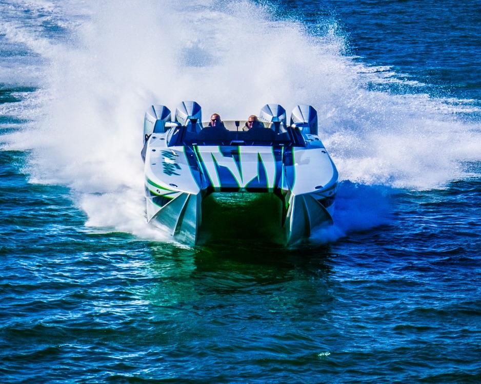 2025 Nor-Tech 4000 Supercat speedboat racing on open water.