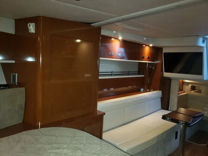 Sol Searching Yacht Photos Pics Interior of 2011 Sea Ray 350 Sundancer yacht with modern furnishings and ambient lighting.