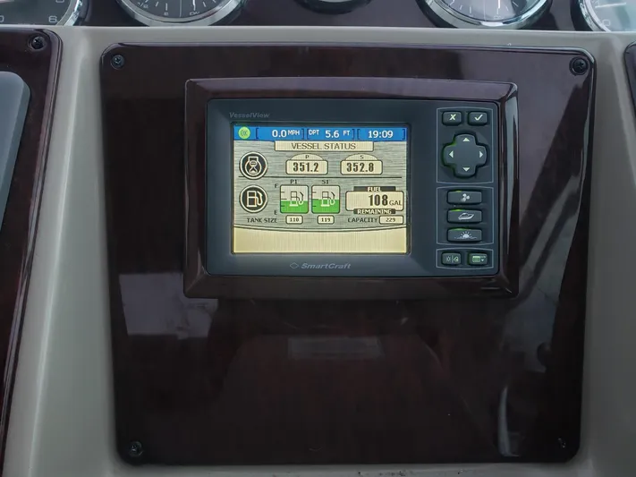 Sol Searching Yacht Photos Pics Control panel display on a 2011 Sea Ray 350 Sundancer boat dashboard.