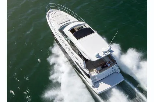 2018 Regal 42 Grand Coupe Yacht Photos Pics 2017 Regal 42 Grande Coupe cruising on open water, aerial view.