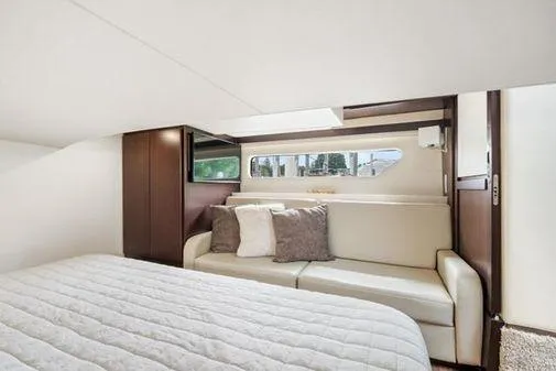 2018 Regal 42 Grand Coupe Yacht Photos Pics Interior of 2017 Regal 42 Grande Coupe with cozy bed and seating area.