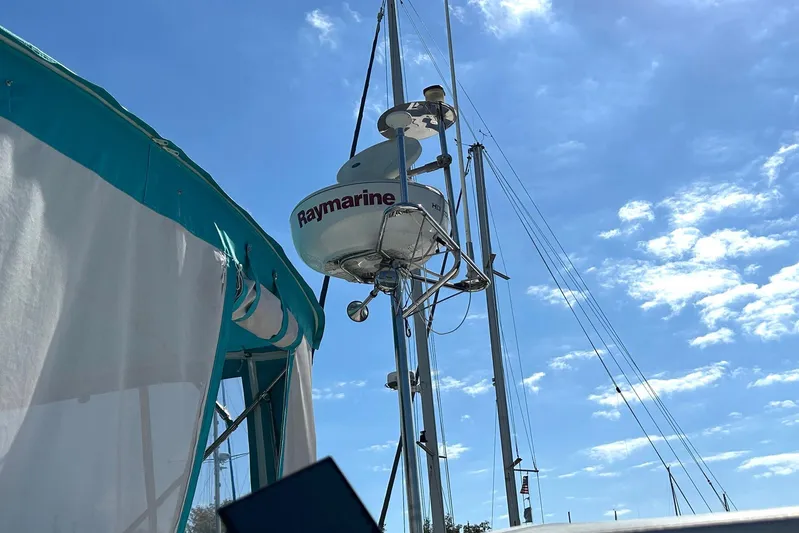 Seahawk Yacht Photos Pics Radar equipment on 2004 PDQ 34 Power Catamaran under clear blue sky.